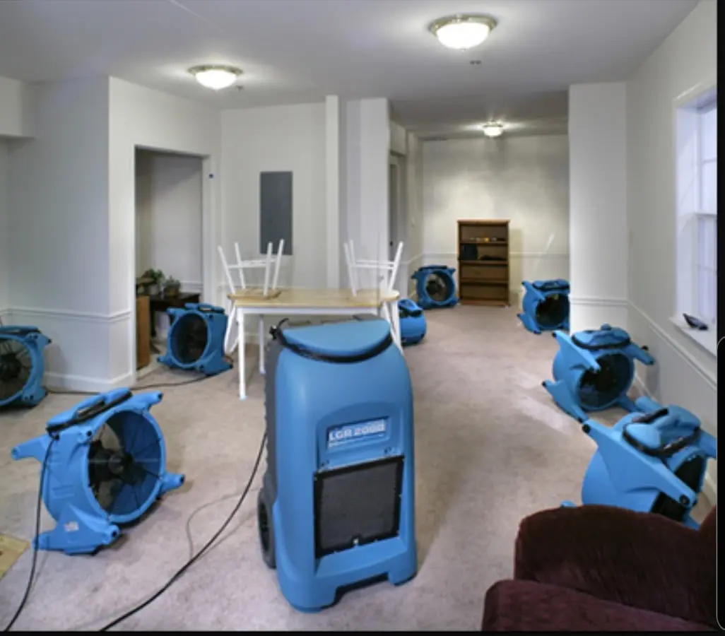 Air movers and dehumidifier setup for Water Damage Restoration in Rockcreek